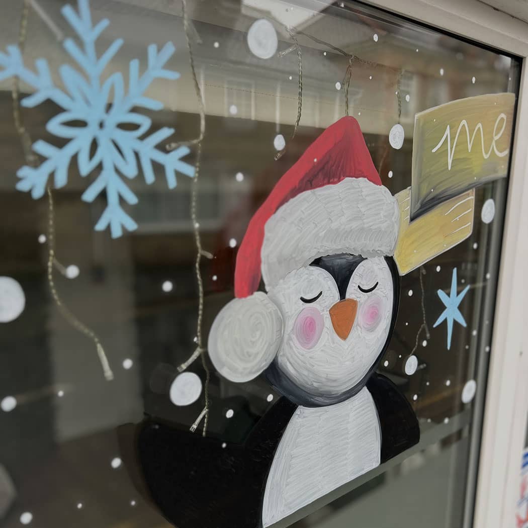 Christmas window art at Wrexham shop