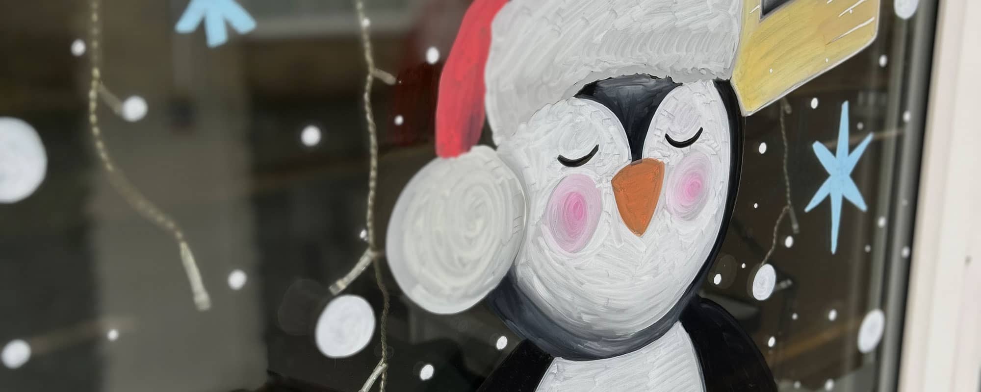 Christmas window art at Wrexham shop